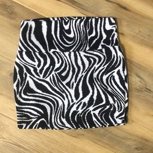 Black and white stretchy mini skirt.